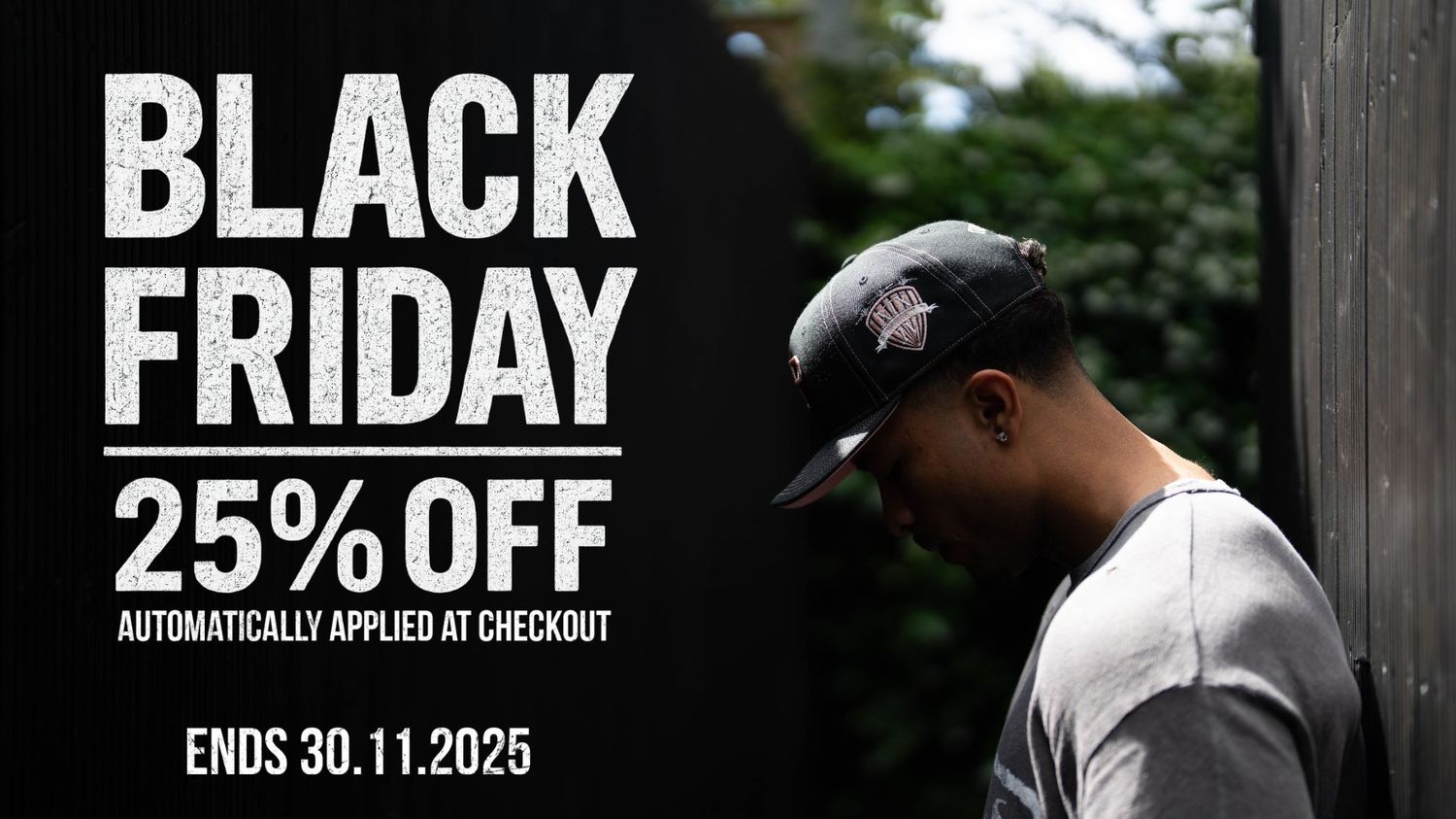 Dark green TP baseball cap with white embroidered logo resting on matte green Mercedes-Benz G-Wagon hood.